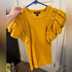 Cute yellow puffy sleeve shirt!